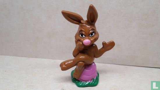 Hare sitting on egg - Image 1