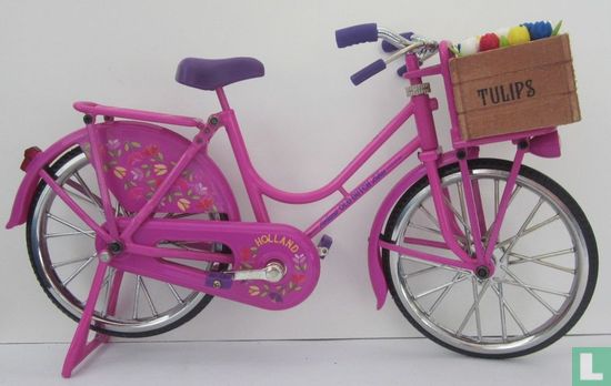  pink exercise bike with tulips - Image 1
