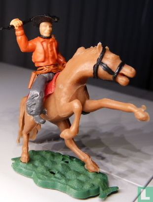 Cowboy on horseback (red) - Image 1