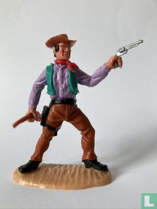 Cowboy with revolver & rifle - Image 1