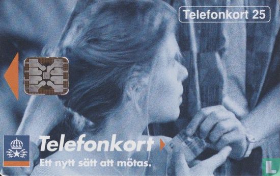 Flicka får telefonkort - Image 1