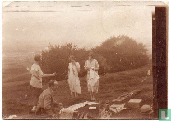 Vintage photograph. Four People on a Picnic