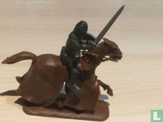 Knight on horseback with sword - Image 1