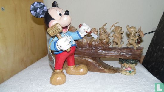 Mickey Mouse carving seven dwarfs on log - Image 1