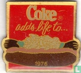 coke adds life to....