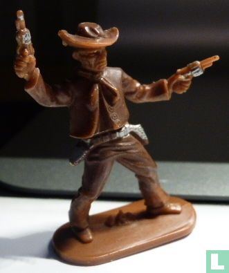 Cowboy avec 2 revolvers tirant en air (marron) - Image 1