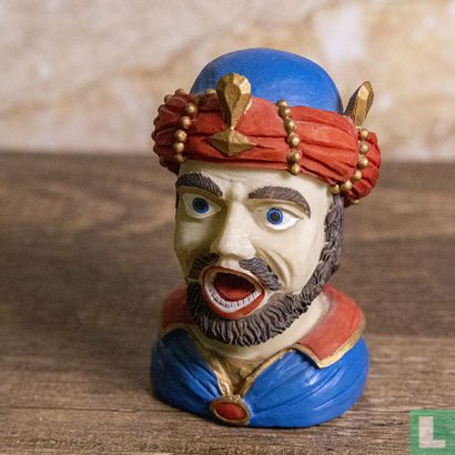 Moor with mustache and beard and red turban with blue cap and gold beads