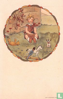 Meisje zit op gras omringd door speelgoed - Image 1