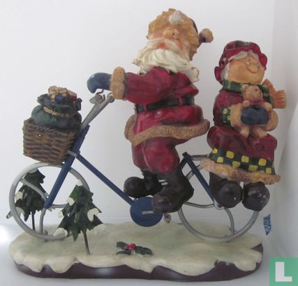 Santa Claus and woman on bicycle - Image 1