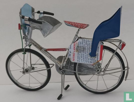 Vélo femme avec siège enfant - Image 1