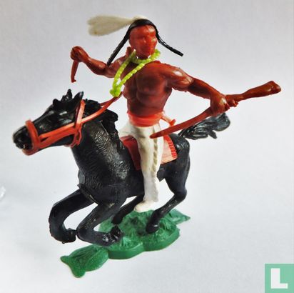 Indiaan met mes en geweer te paard - Afbeelding 1