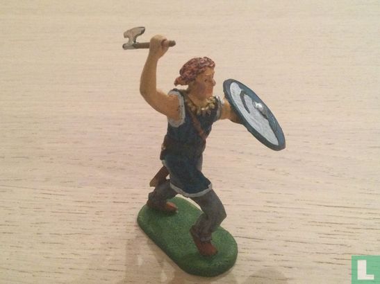 Warrior attacking with axe - Image 1