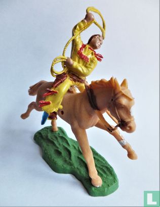 Cowboy met lasso te paard  - Afbeelding 1