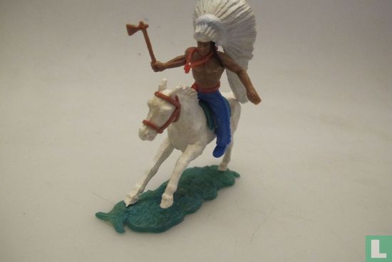 chief on horseback with an ax in his right hand
