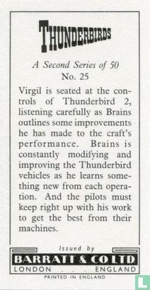 Virgil is seated at the controls of Thunderbird 2, listening carefully as Brains outlines some improvements he has made to the craft's performance. - Afbeelding 2