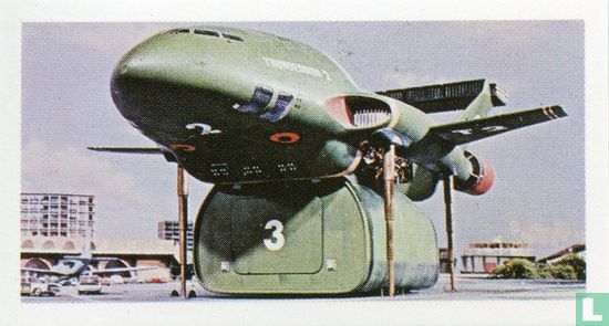 The gigantic Thunderbird 2 craft prepares to unload rescue equipment from one of its pods. - Afbeelding 1