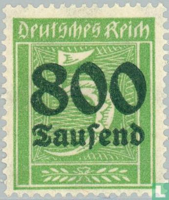 Figure in rectangle with overprint