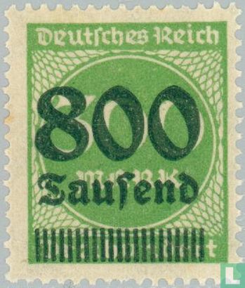 Figure in circle with overprint