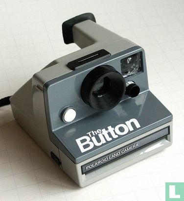 50 - SX-70  -THE BUTTON- (text front left) - Afbeelding 1
