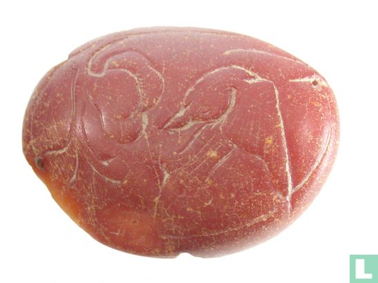 Bird - Chinese charm / amulet made from amber