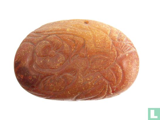 Bird with Lotus Leaf - Chinese charm / amulet made from amber 