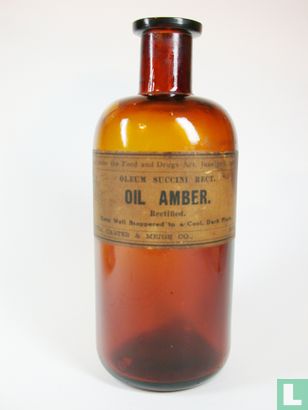 Amber bottle with "OIL AMBER" label .... - Image 2