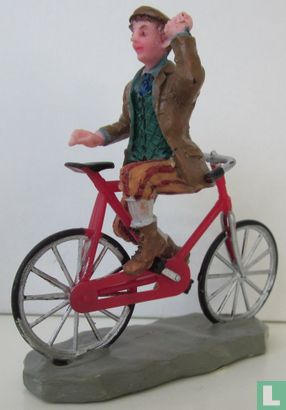 plastieke fiets met jonge heer erop (Risky business) - Afbeelding 2