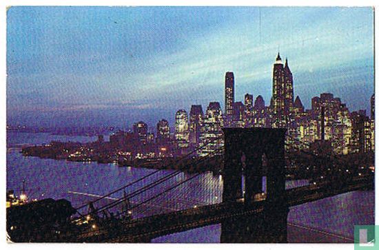 Nightfall in Lower Manhattan, with Brooklyn Bridge, New York City