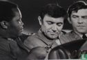 James Bond is captured by several unindentified men - Afbeelding 1