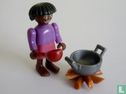 Vrouw met kookpot - Afbeelding 1