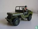 U.S. Army Jeep with 105 mm Howitzer - Image 1