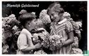 hartelijk Gefeliciteerd - Jongen en meisje tussen de bloemen - Bild 1