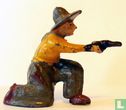Cowboy kneeling - Image 1