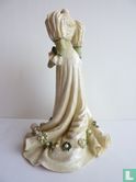 Mannequin dress in cream with green details of - Image 2