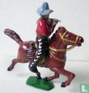Mounted cowboy (firing rifle)