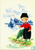 Jongetje in klederdracht die aan het vissen is - Image 1