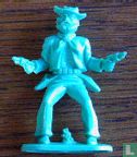 Cowboy met 2 revolvers schietend vanuit heup (groenblauw) - Afbeelding 1