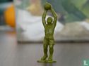 Boy Scout Holding basketball overhead - Afbeelding 1