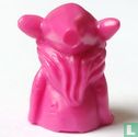 Pink dwarf sitting