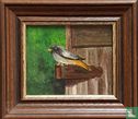 Vogel op scharnier van deur - Afbeelding 1
