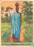 Bahima-vrouw boter dragende - Image 1