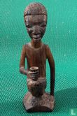 African wooden figurine - Image 1