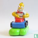Homer Simpson on mower - Image 1