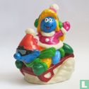 Smurf and Smurfette  on sled - Image 1