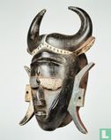 A mask with large buffalo horns from the Jimini People - Image 1