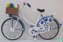 Delft blue exercise bike with tulips - Image 1