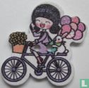 Knoop meisje op fiets - Afbeelding 1