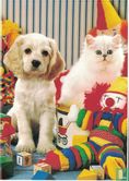 Kitten en puppy tussen kinderspeelgoed - Afbeelding 1