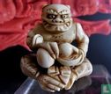 Ivory netsuke of a seated ONI signed KOKU pouring drinks from DOUBLE GOURD Meiji 19th - Image 1