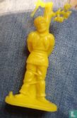 Cowboy tied to totem pole (Yellow) - Image 1